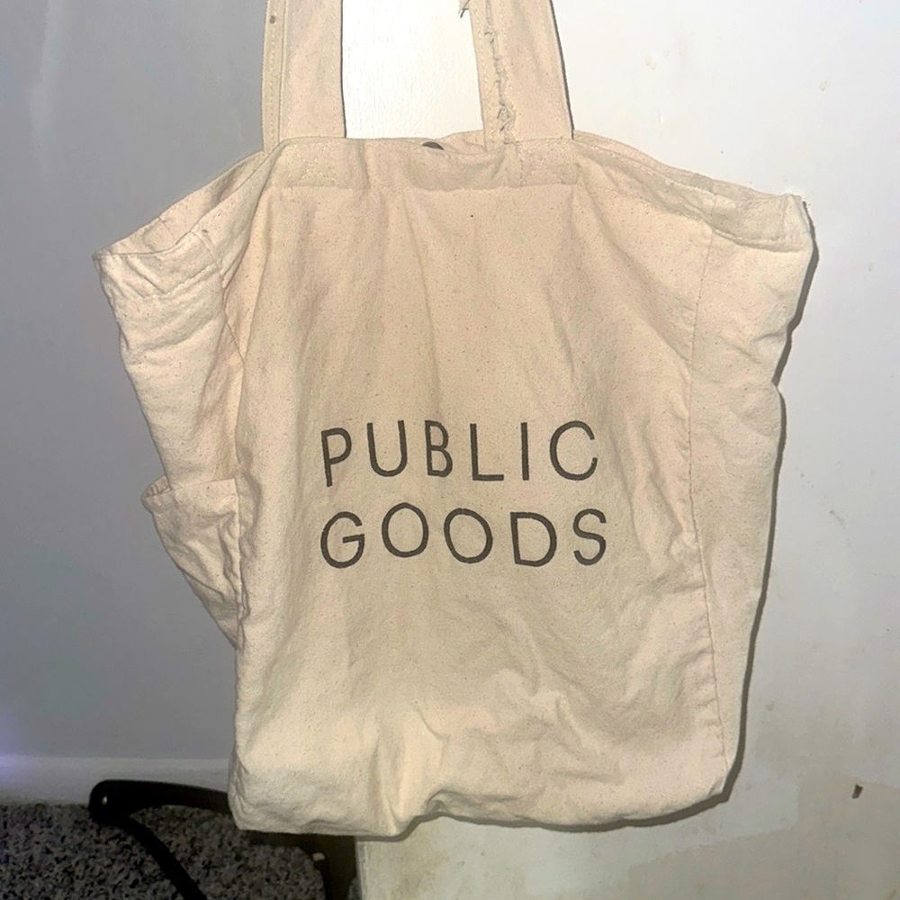 Public Goods Canvas Tote bag. Has 2 inner pockets one zippered, & bottle pocket.
